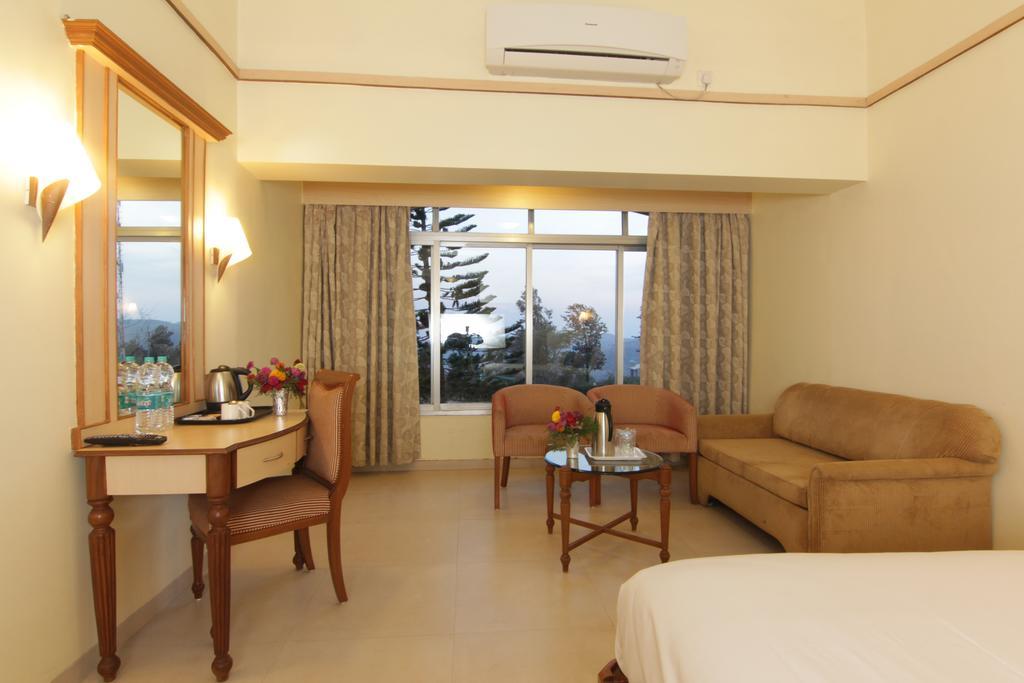 บลู คันทรี่ รีสอร์ต Hotel พันช์กานี ห้อง รูปภาพ